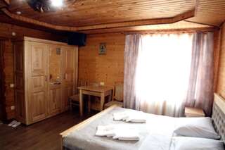 Отель Zatyshok nad Prutom Буковель Семейный люкс-23